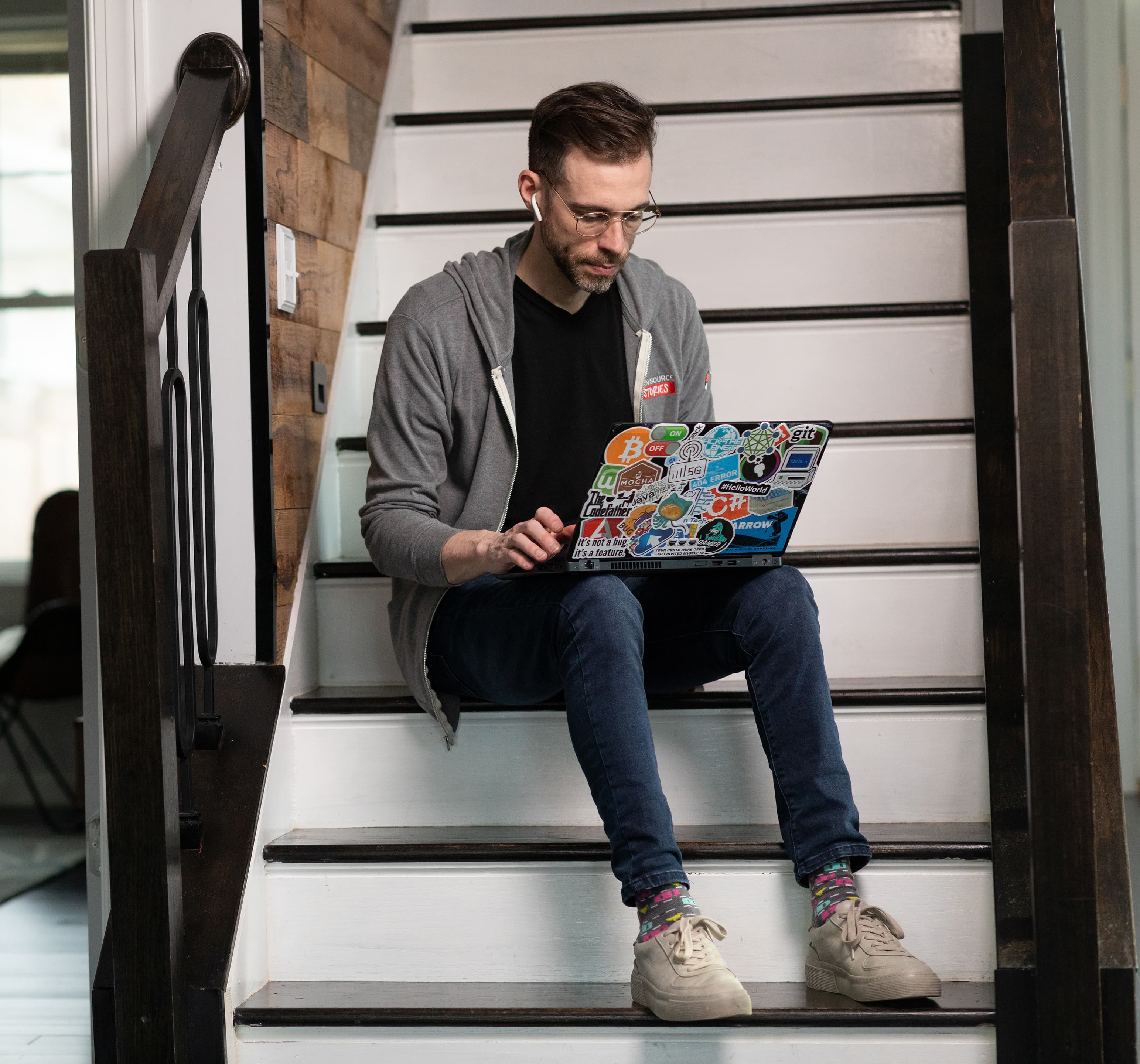 Developer looking at their laptop while they work